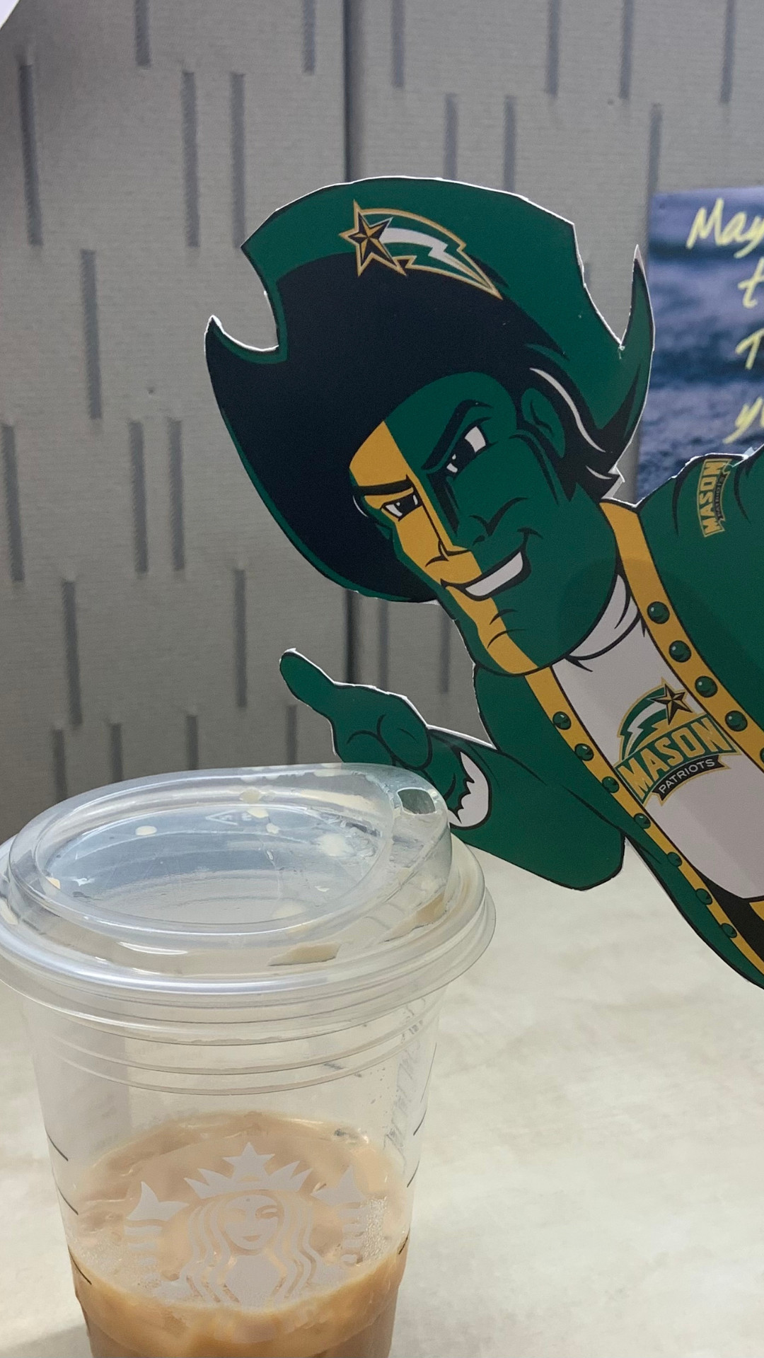 Flat Patriot drinking his coffee in the office