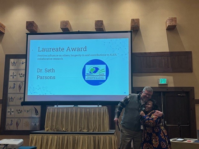 Dr. Seth Parsons receiving the Laureate Award