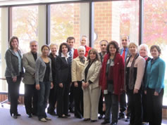 Spring 2011 DelPHE-Iraq cohort posing with Mason faculty and administrators.
