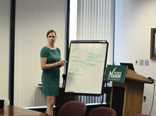 Caitlin Haugen leading faculty in a discussion 