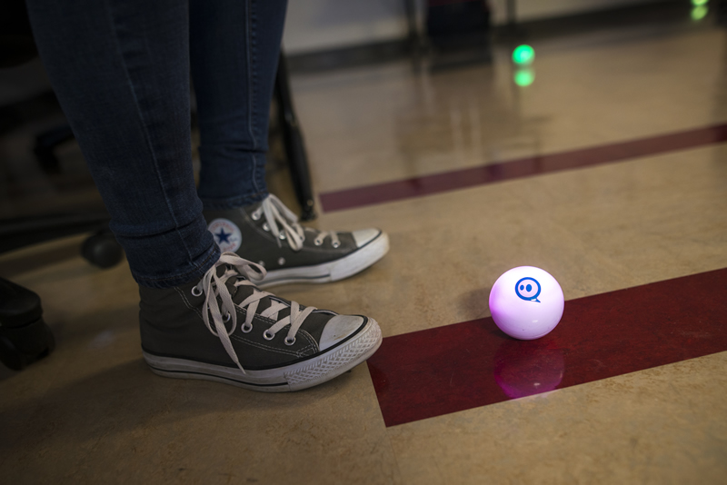 students programming Sphero robots