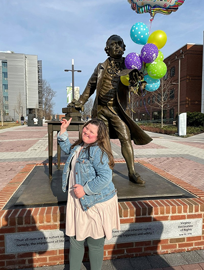 Paloma in front of Mason statue